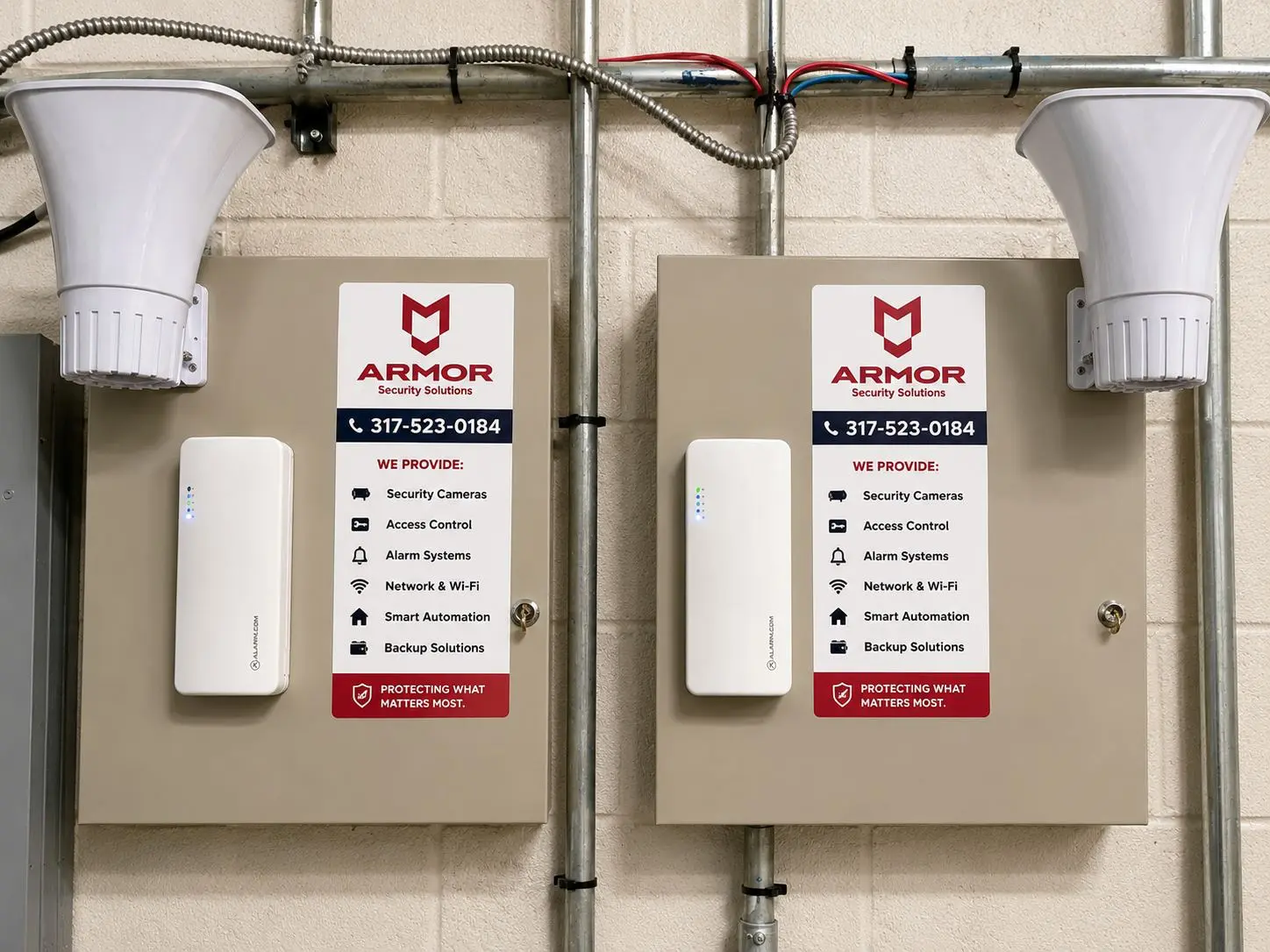 Armor Security technicians completing a alarm systems project at an Indianapolis property