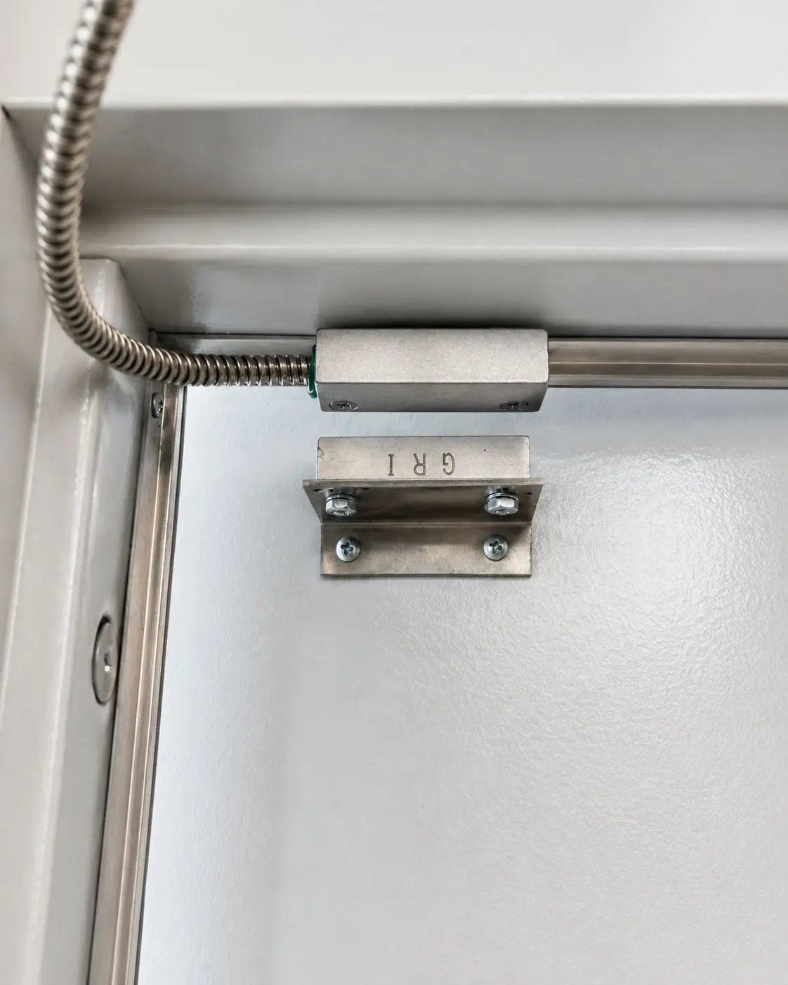 Close-up of installed alarm systems equipment mounted on site